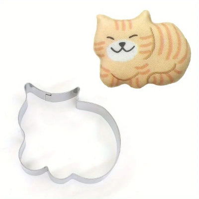 Emporte pièce en forme de chat avec chat tigré