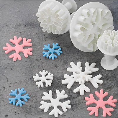 Emporte pièces Noël Festivo avec flocons blanc rose et bleu