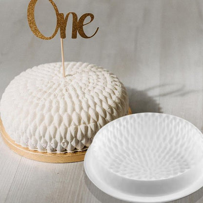 Moule à gâteau en silicone Géométrik  sur table blanche