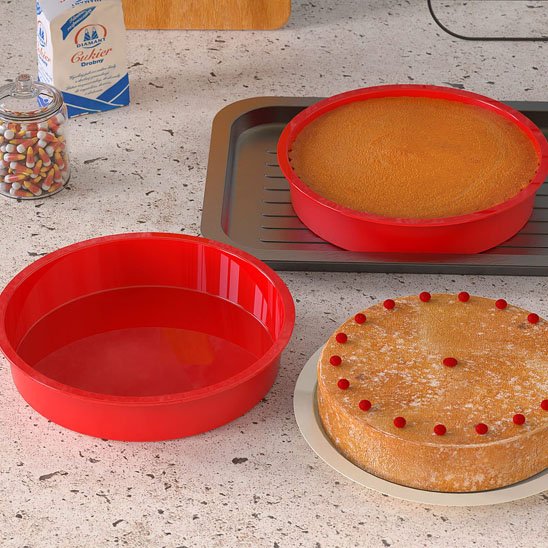 2 Moules en silicone rouge sur plaque de cuisson